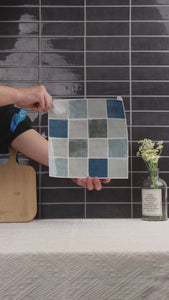 blue and grey checkered peel and stick tiles installation