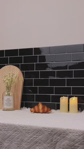Black subway peel and stick wall tiles installation
