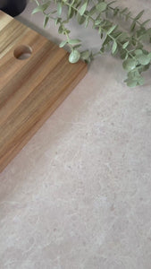 close up video of Sierra taupe marble adhesive vinyl