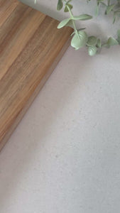 close up video Dune Stone micro terrazzo warm greige adhesive vinyl